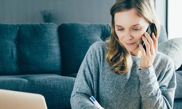 woman talking on the phone with work at home agent