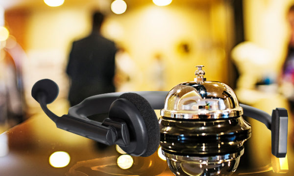 hotel bell with work at home customer service headset in a hotel background