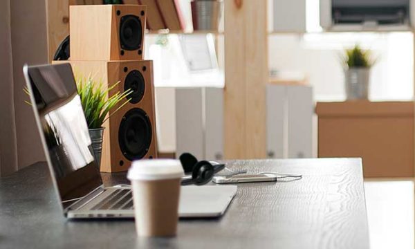 laptop customer service headset on work at home desk