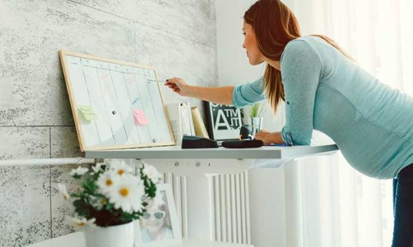 woman working on schedule work from home