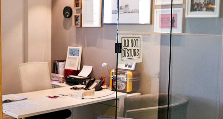office with a do not disturb sign
