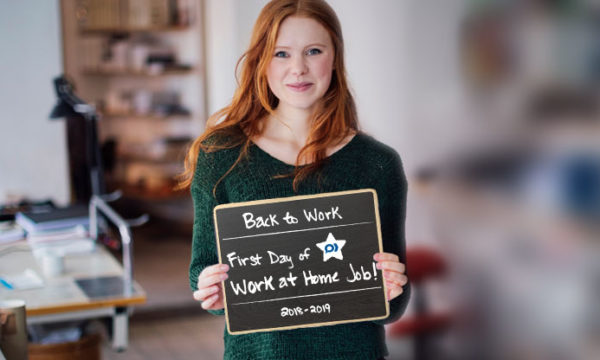 woman holding work at home job offer