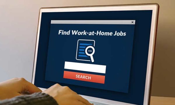laptop with a screen that reads search work from home jobs