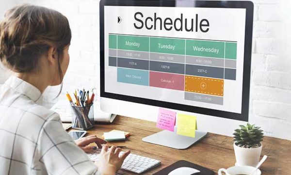 woman working from home deciding how to best break her days for most productive