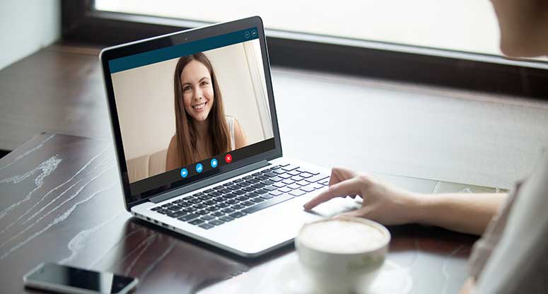 woman doing a video meeting 