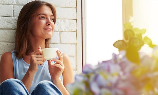 work at home woman getting inspired by quotes