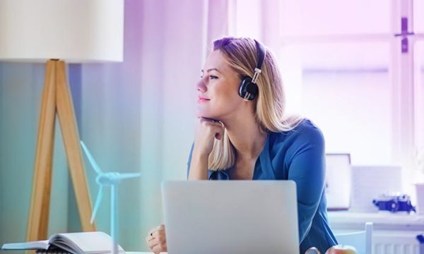 work at home woman talking to customer from home