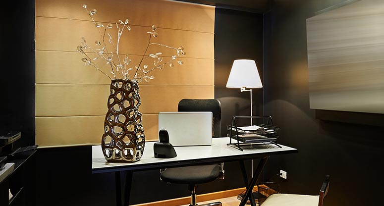 work at home office with a lamp that gets the office well lit