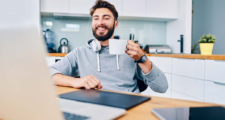 man working from home taking a break after long shift