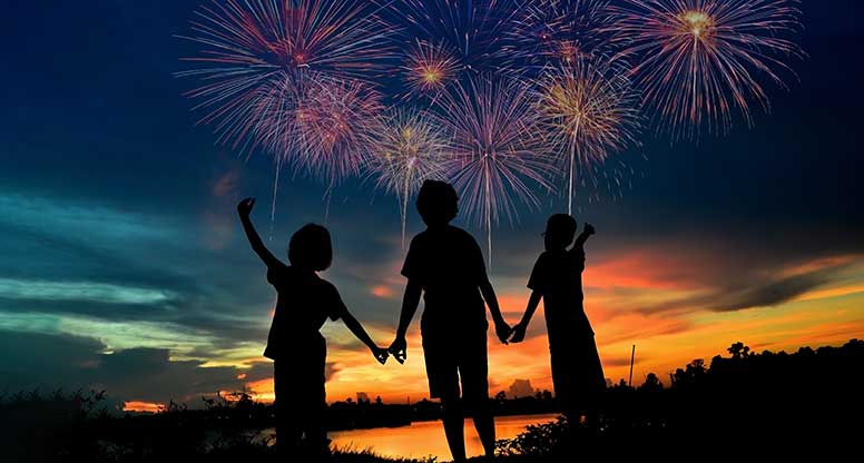 Kids looking at fireworks for the Fourth of July weekend after parents worked from home