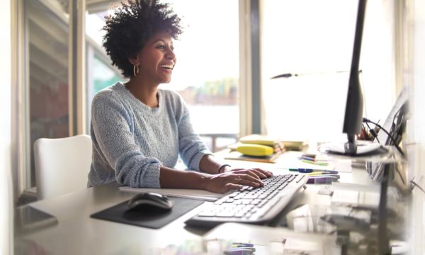 woman working from home learning computer skills