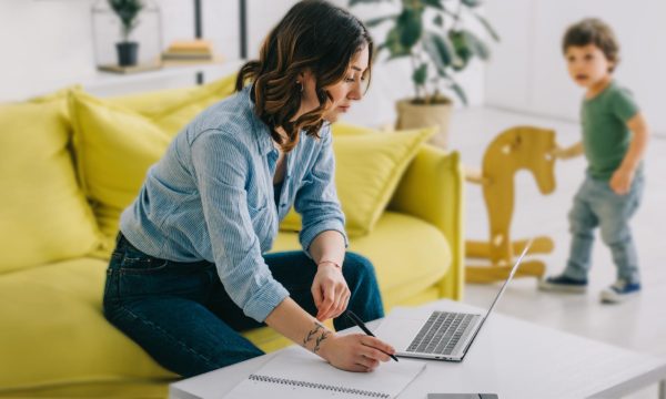 woman working from home and trying to balance personal life
