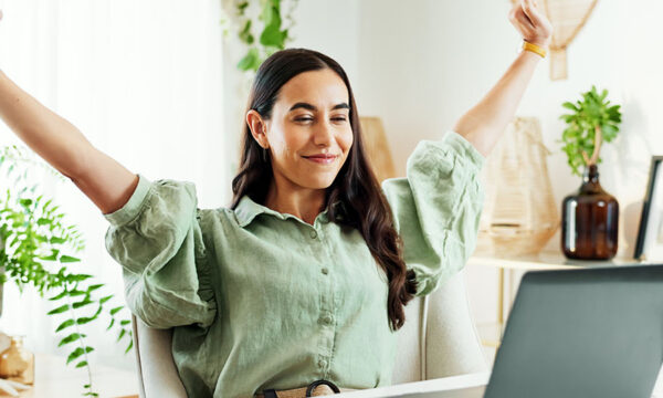 Achieved work-from-home agent stretches in confidence in her at-home office